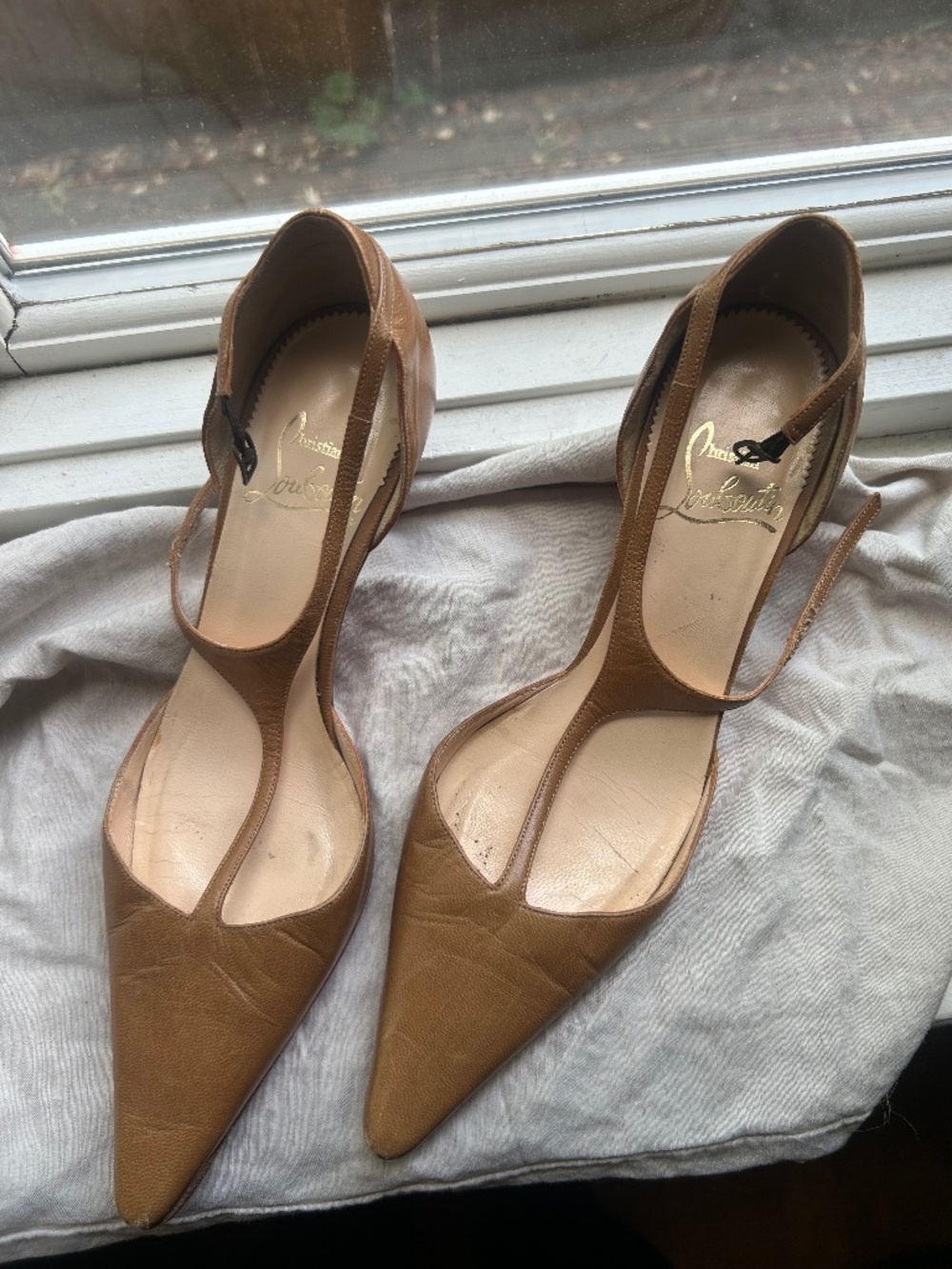 Christian Louboutin beige pumps